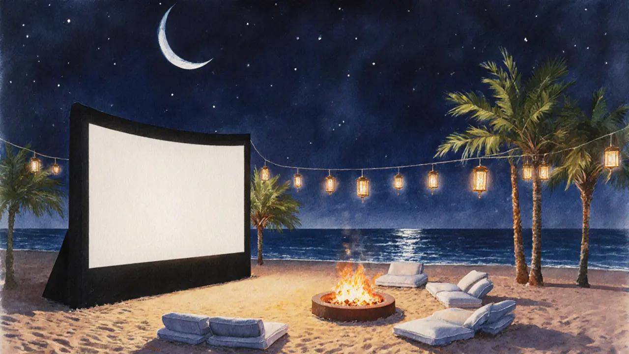 Open‑air beach cinema on Saadiyat Island with lanterns and a moonlit sky.